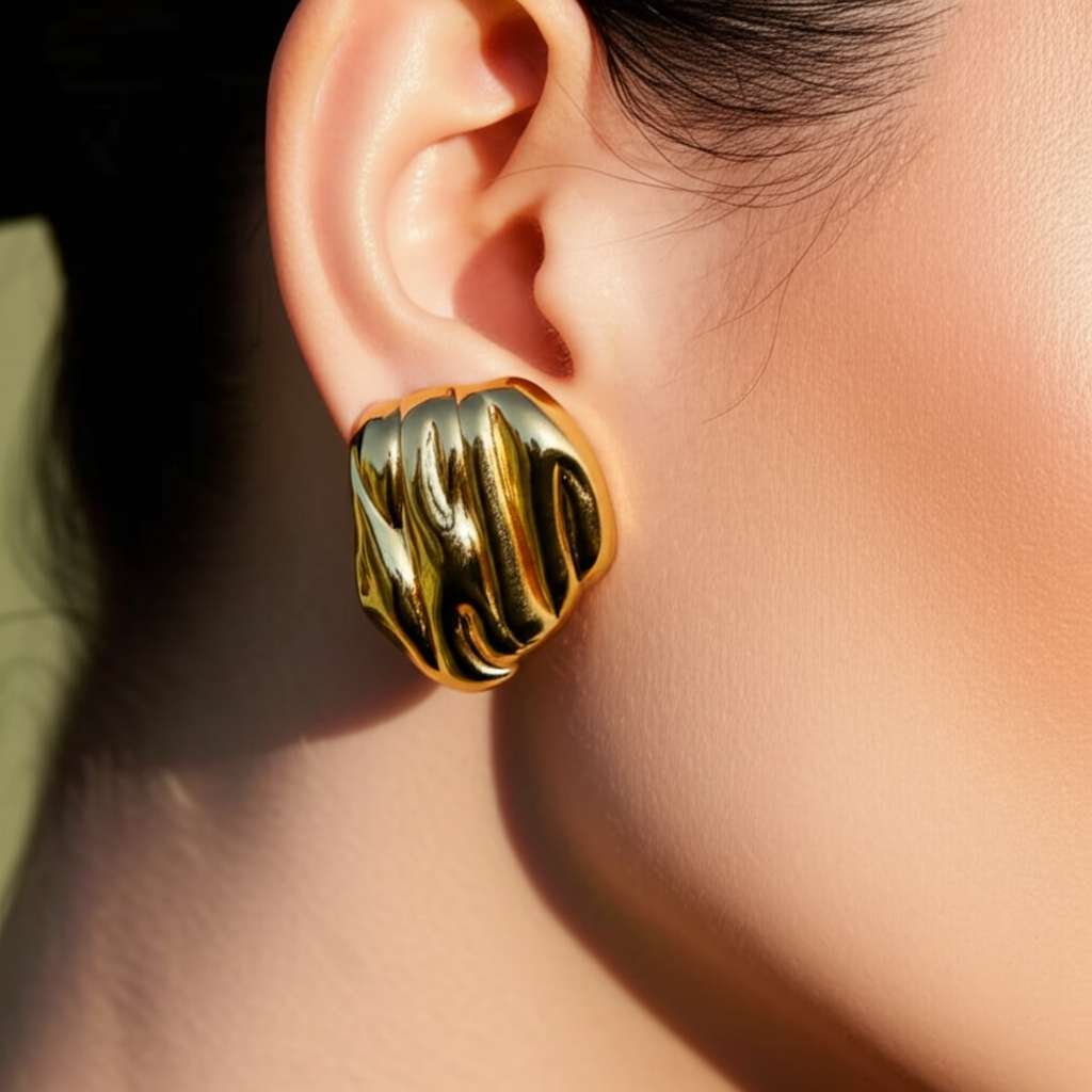 Gold toned oval shaped studs - Earrings - View 1